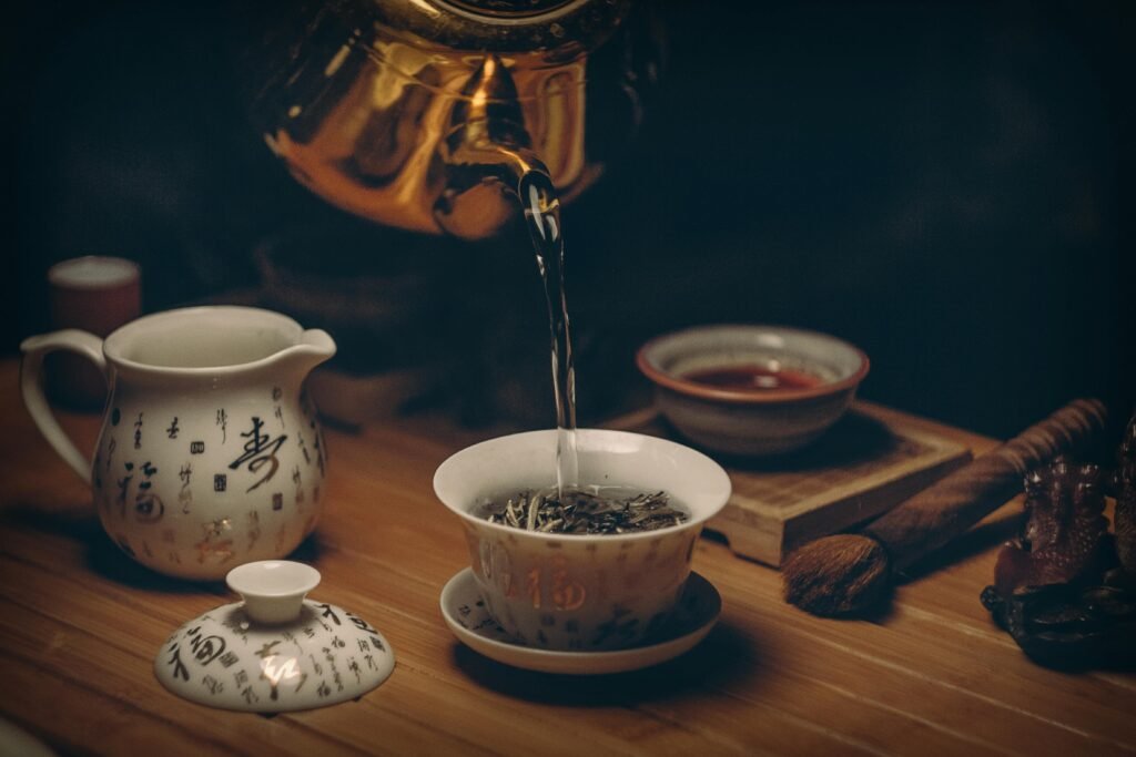 Artistic depiction of a traditional Chinese tea ceremony with porcelain teaware and hot water pour. herbal berberine tea